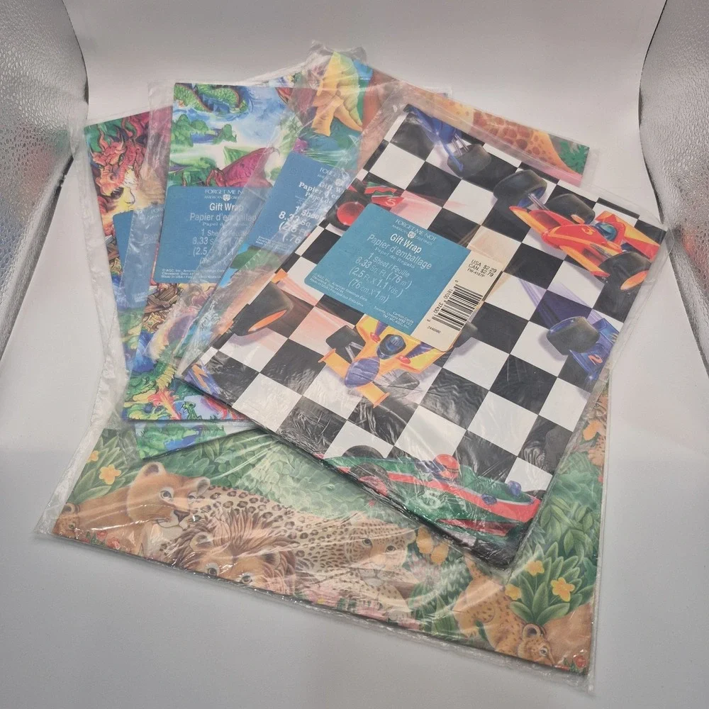 Lot of 5 Vintage Gift Wrap. Racecars x1  Dragons x2  Dinosaurs x1 & Tigers x1.